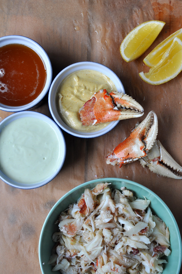 Fresh cracked Dungeness crab with a trio of dipping sauces.