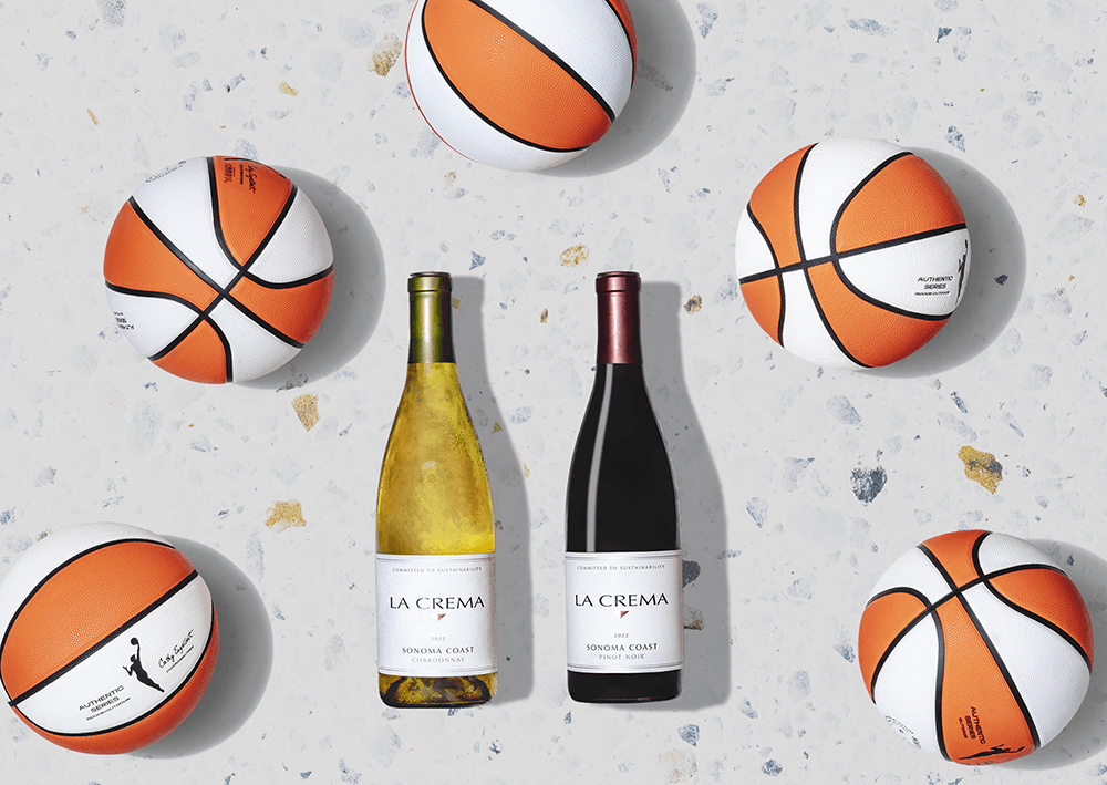 wnba basketballs with two bottles of wine, chardonnay and pinot noir from the sonoma coast